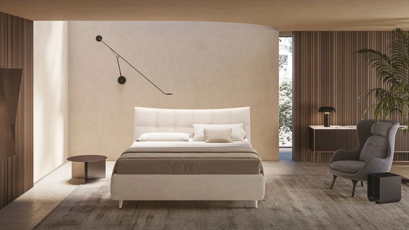 Letto con testiera capitonné Allison di Ergogreen